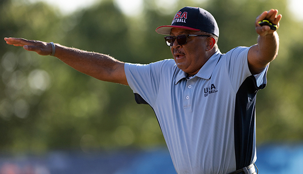 Umpire Lee Gray calls a runner safe during the 2024 Armed Forces Men’s and Women’s Softball Championship hosted by USA Softball at the USA Softball National Hall of Fame Complex in Oklahoma City Aug 16, 2024. (DoD photo by EJ Hersom).